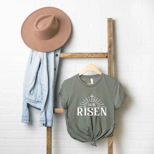 He Is Risen Cross In Sun Ray | Short Sleeve Crew Neck