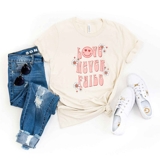 Love Never Fails Smiley | Short Sleeve Crew Neck