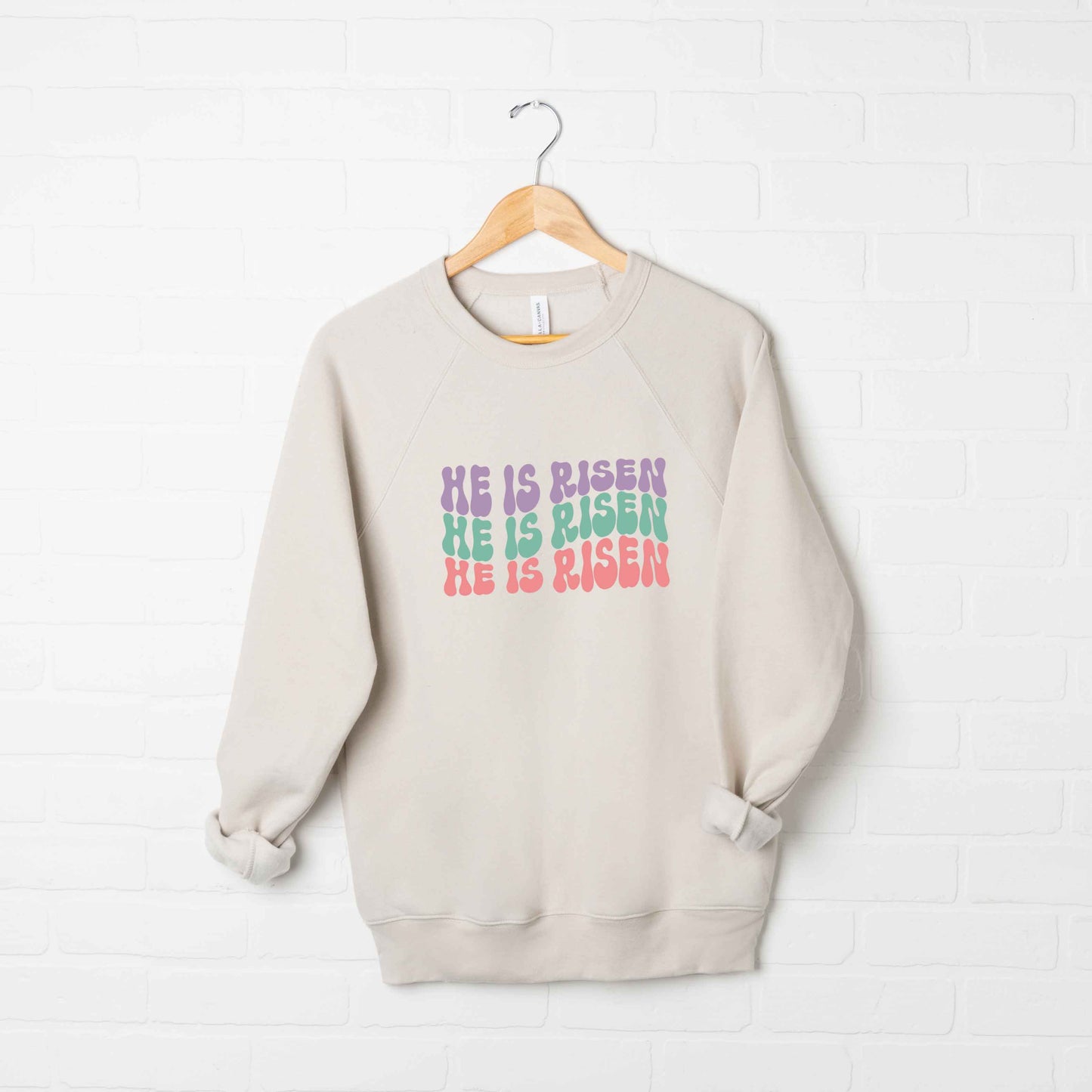 He Is Risen Stacked Wavy Colorful | Bella Canvas Premium Sweatshirt