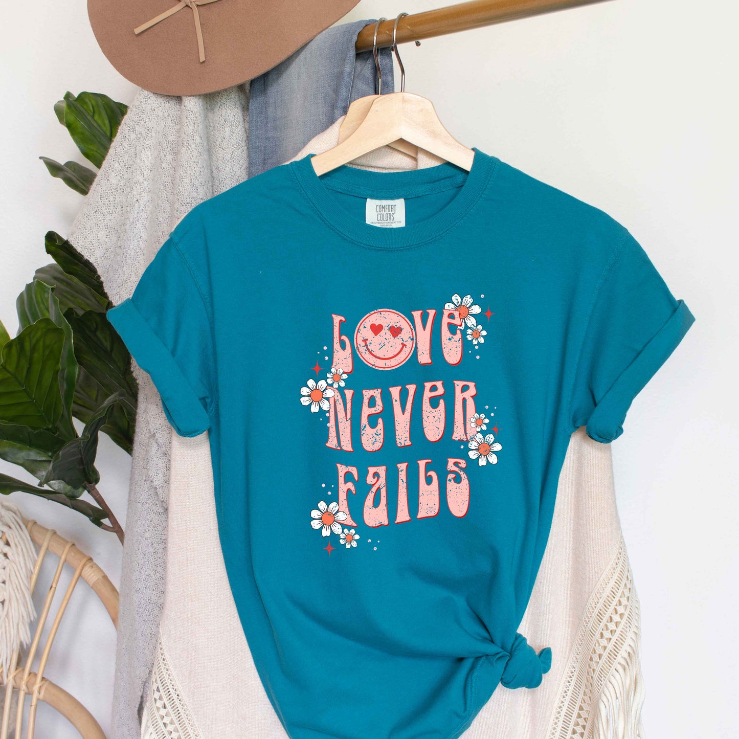 Love Never Fails Smiley | Garment Dyed Tee