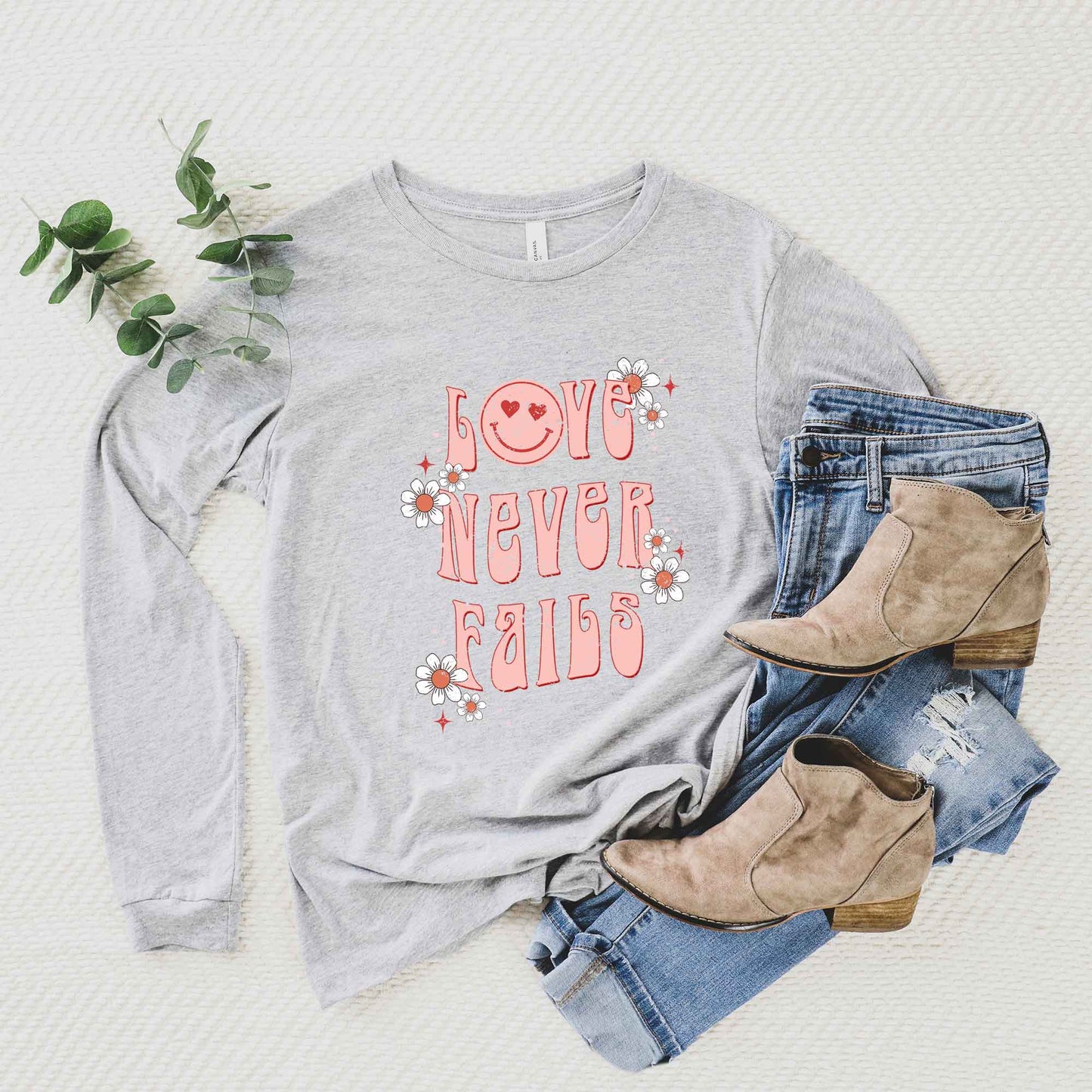 Love Never Fails Smiley | Long Sleeve Crew Neck