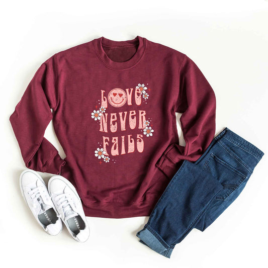 Love Never Fails Smiley | Sweatshirt