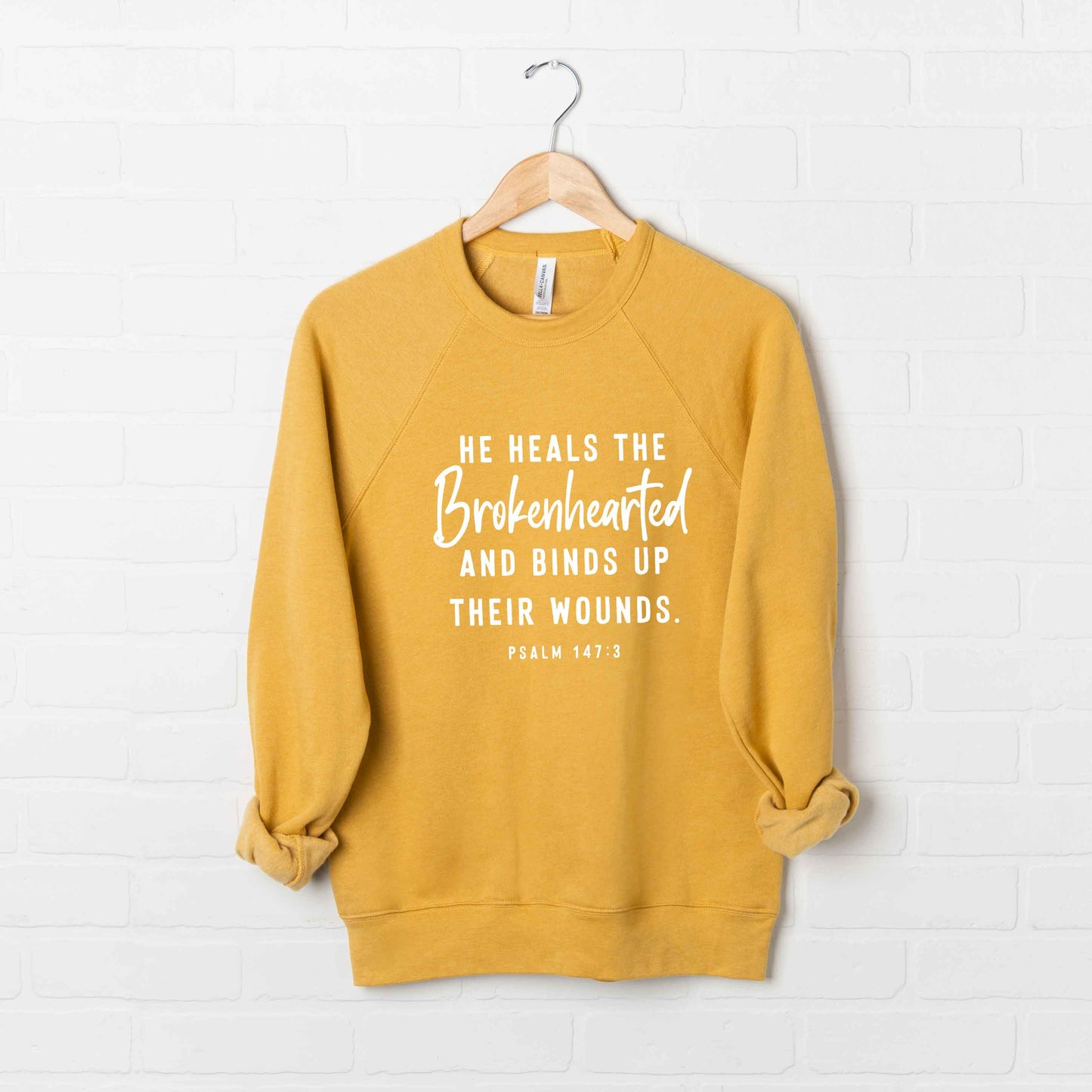 He Heals The Brokenhearted Script | Bella Canvas Premium Sweatshirt